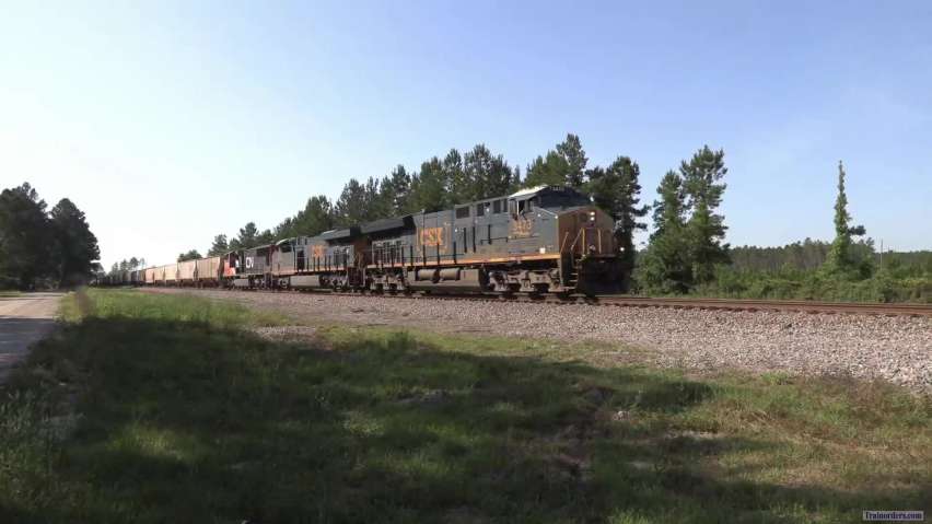 Loaded CSX phosphate train with CN SD75I