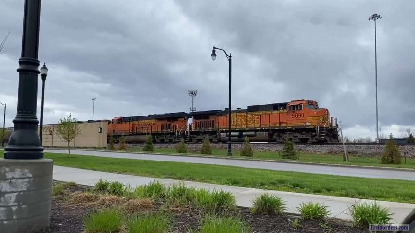 Erskine, MN-to-Tacoma, WA loaded grain train passing Grand Forks.